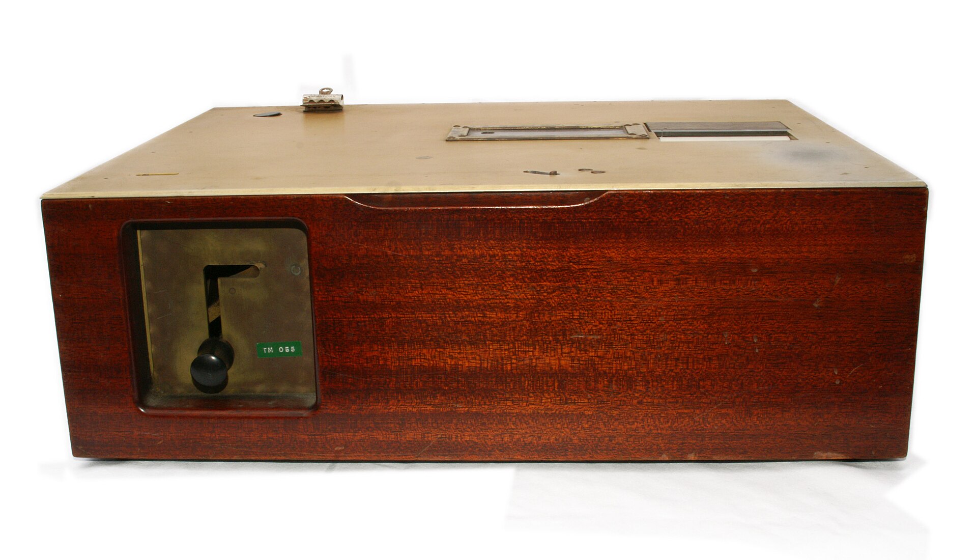 Another view of the same teaching machine, its mechanism visible through the casing.